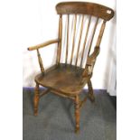 A Victorian country arm chair.