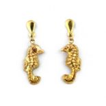 A pair of 9ct yellow gold sea horse shaped drop earrings, L. 2.5cm.