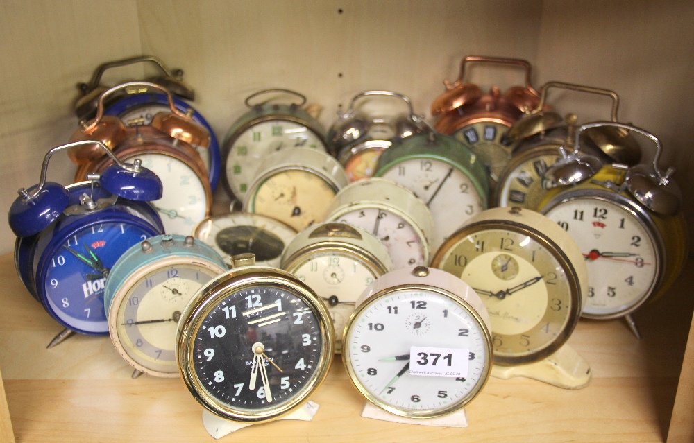 A collection of vintage alarm clocks.