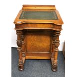 A Victorian golden oak Davenport desk, H. 85cm.