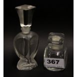 A Lalique perfume bottle (H. 13cm) and a further possibly Baccarat perfume bottle.