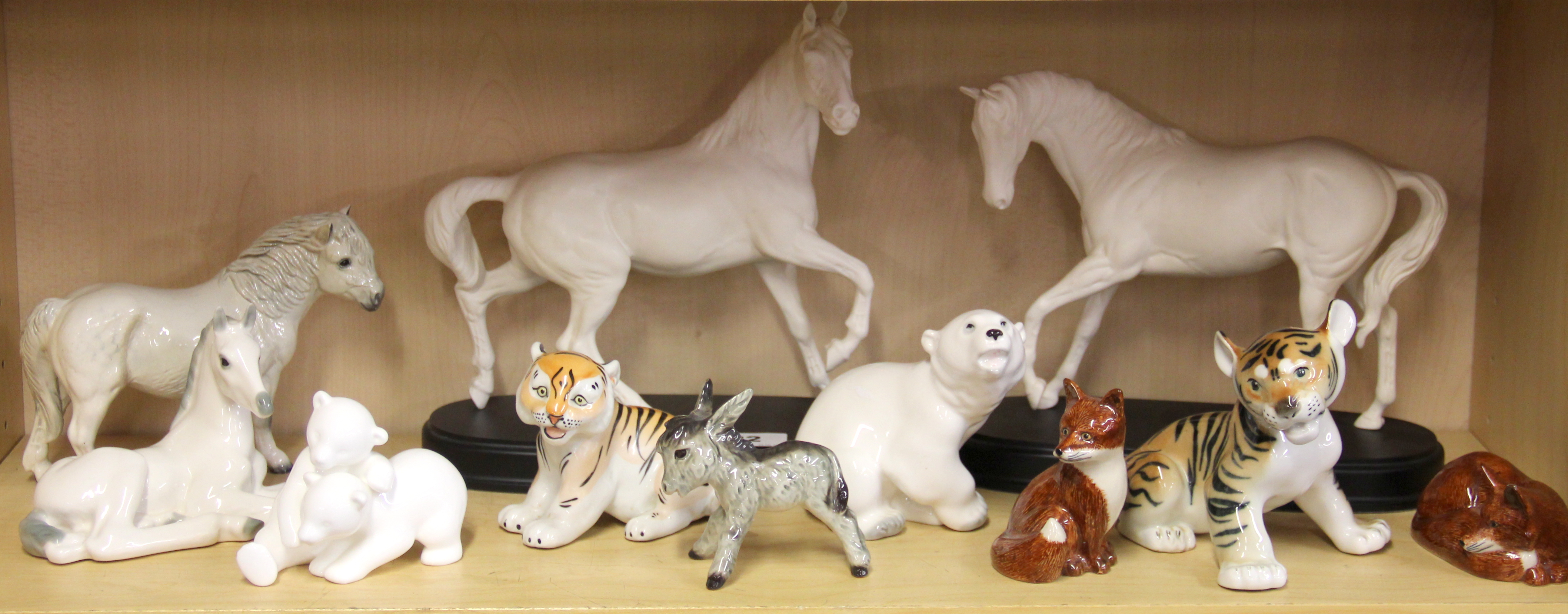 Two Royal Doulton horse figures, "Spirit of Youth" and "Spirit of the wind", together with a Royal