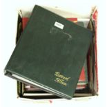 A quantity of stamp albums and postcards.