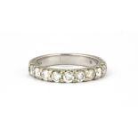 An 18ct white gold ring set with brilliant cut diamonds, (L).