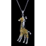 A 925 silver giraffe shaped pendant and chain set with sapphires and fancy yellow sapphires, L.