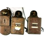 Three vintage items of telephonic equipment.