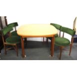 A G-Plan extending teak dining table and four chairs, W. 112cm.