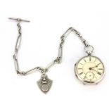 A hallmarked silver open face pocket watch with a hallmarked silver Albert chain and fob, Chester c.