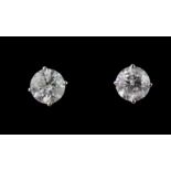 A pair of 18ct white gold (stamped 750) diamond set stud earrings, approx. 1.65ct overall.