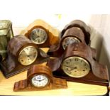 Six wooden mantle clocks. Condition: working condition unknown.