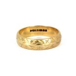 A 9ct yellow gold wedding band, approx. 3.6gr, (O).