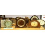 Ten vintage mantle clocks. Condition: working condition unknown.