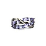 A 925 silver tanzanite and white stone set ring, (N.5).