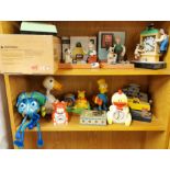 A group of television and film related character collectibles.