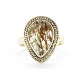 A 925 silver ring set with a cabochon pear cut rutile quartz, (S).