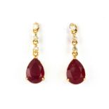 A pair of 18ct yellow gold drop earrings set with pear cut rubies and diamonds, L. 1.7cm.