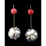 A pair of yellow metal drop earrings set with carved antique ivory Japanese ojime and coral, L. 4.