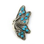 A 925 silver and marcasite brooch set with turquoise, 7 x 3cm.