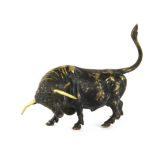 A bronze model of a bull, L. 11cm.