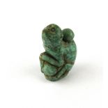 A Chinese carved mottled green hardstone monkey snuff bottle, H. 7cm.