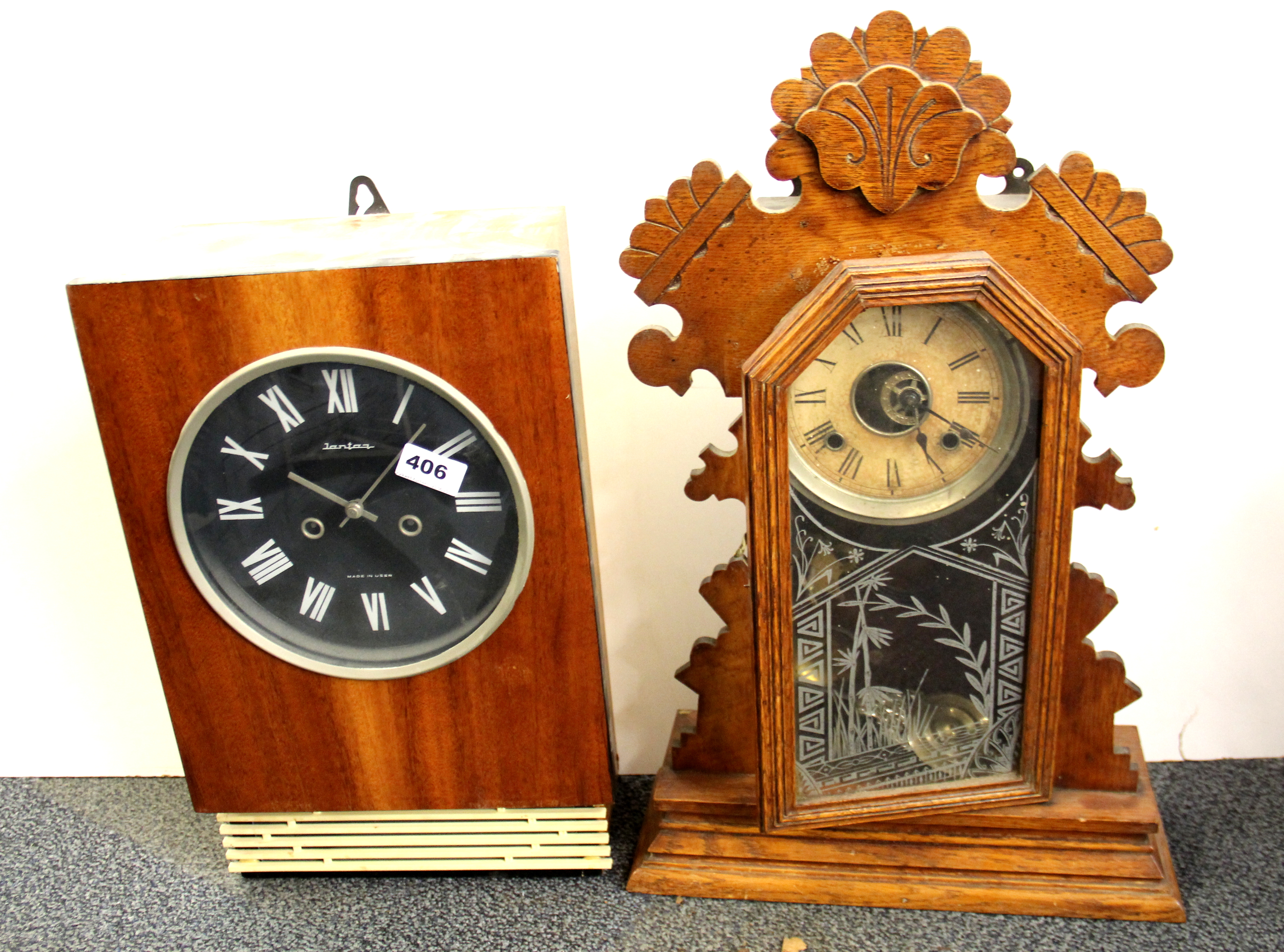 A vintage Russian striking wall clock and a 19th century American oak mantle clock, Russian wall