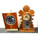 A vintage Russian striking wall clock and a 19th century American oak mantle clock, Russian wall