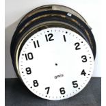 A vintage exterior wall mounted electric shop display clock frame, 82cm.