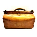 An antique leather Gladstone bag, W. 48cm.