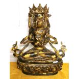 A superb Tibetan gilt bronze temple figure of Yab-Yum and consort, H. 51cm. Condition: overall good.