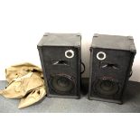 A pair of large musician's loud speakers and covers, H. 74cm.