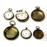 A group of silver pocket watches and watch cases.