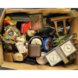 A box of small mixed vintage clocks.