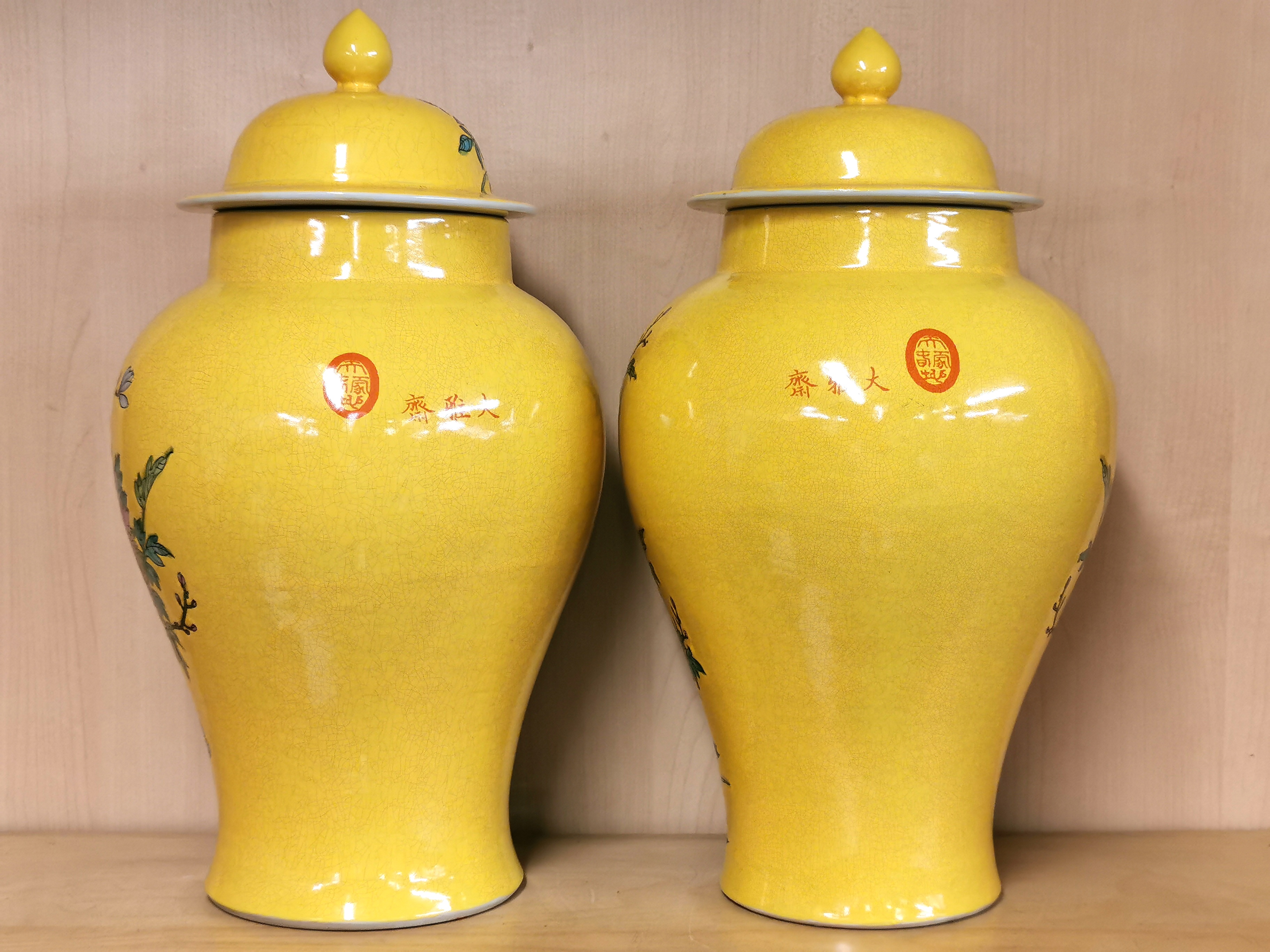 A pair of Chinese hand painted Imperial yellow porcelain jars and lids decorated with peacocks, H. - Image 3 of 5