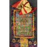 A Tibetan silk mounted hand painted Thangka of the green Tara, W. 61cm H. 83cm.