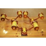 Three Art Deco copper wall lights, W. 39cm.