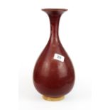 A Chinese sang de boeuf glazed pottery vase, H. 34cm. Condition : no visible damage or repair.