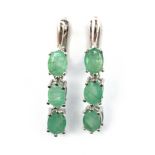 A pair of 925 silver drop earrings set with oval cut emeralds, L. 5cm.