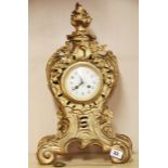 A 19th Century French gilt brass mantle clock with striking movement, H. 51cm. Working condition :