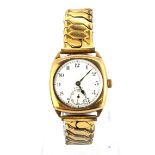 A 9ct yellow gold presentation wrist watch on an expandable strap.