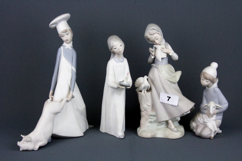 Four Lladro bisque porcelain figures of children, tallest 24cm. Condition: candle stick detached