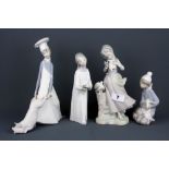 Four Lladro bisque porcelain figures of children, tallest 24cm. Condition: candle stick detached