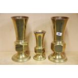Three heavy brass ecclesiastical vases, tallest 31cm, two with presentation engravings, one of which