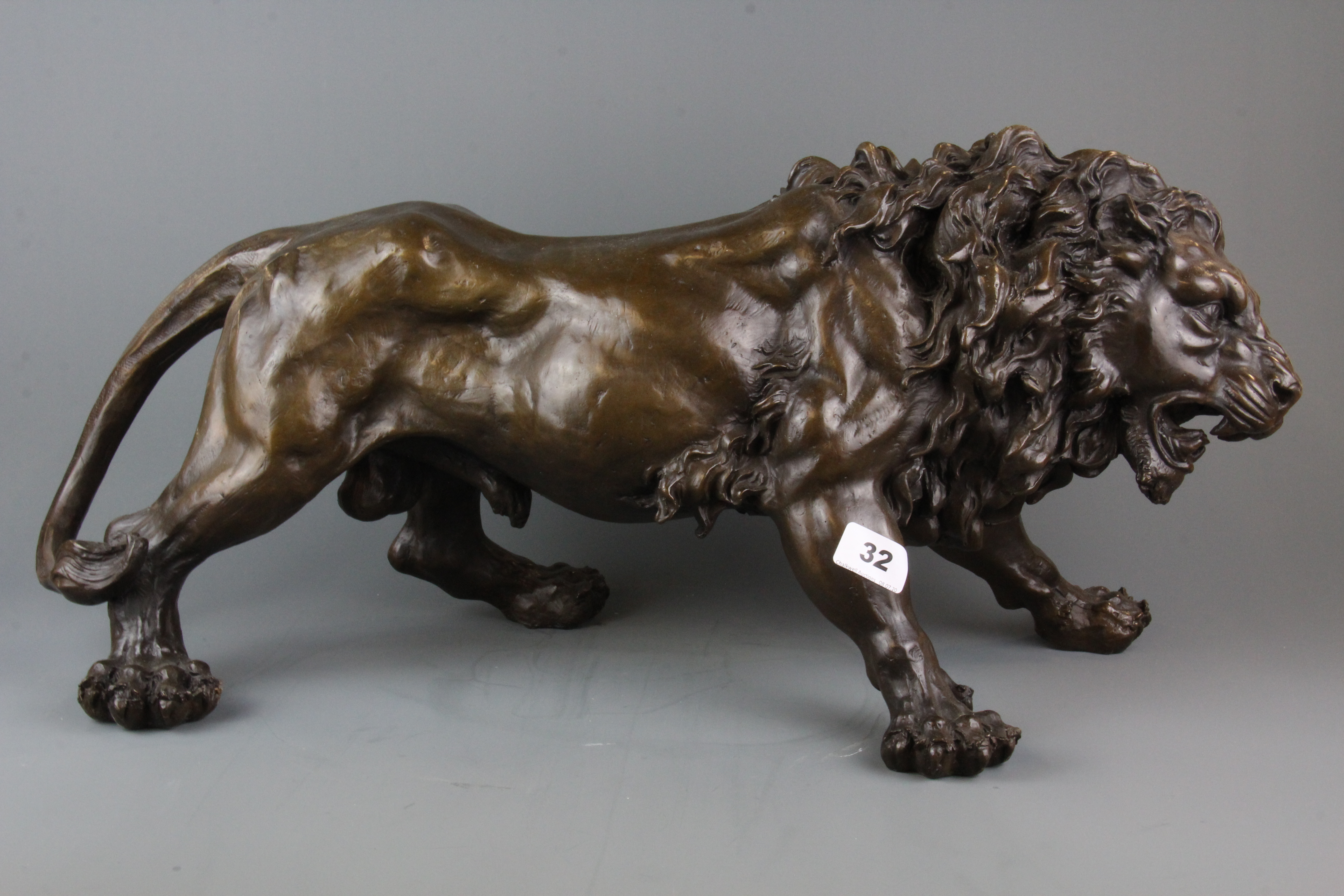 A superb large bronze figure of a lion, L. 62cm, H. 28cm. Condition: excellent.