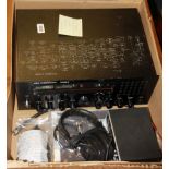A Ham international jumbo amateur radio with modifications, a frequency counter, earphones and