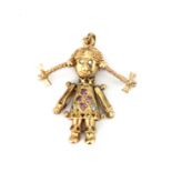 A 9ct yellow gold articulated doll stone set pendant, approx. 2.6gr, L. 3cm.