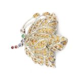 A 925 silver butterfly shaped brooch set with yellow sapphires, emerald, ruby and sapphires, 4 x 3.