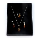 A pair of 925 silver amber set drop earrings and matching pendant, together with a silver and