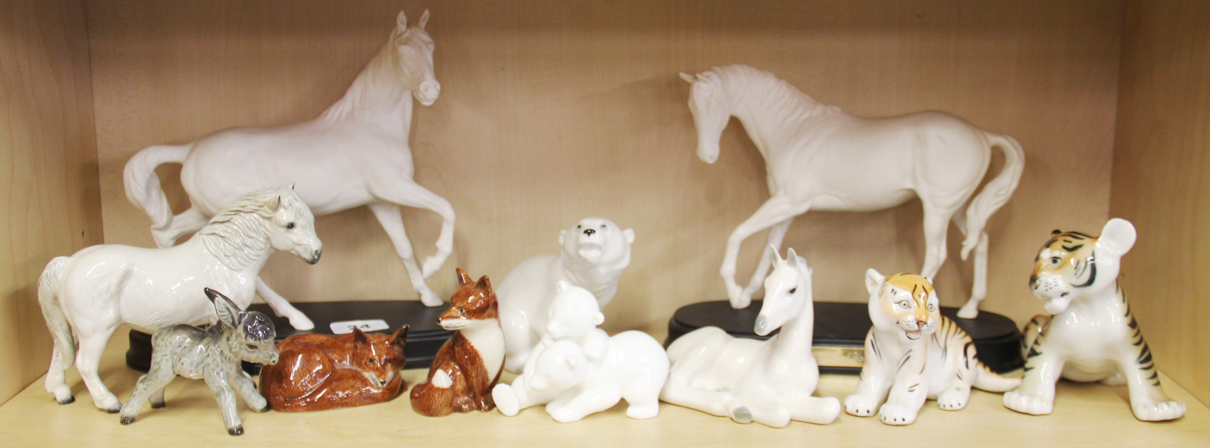 Two Royal Doulton horse figures, "Spirit of Youth" and "Spirit of the wind", together with a Royal