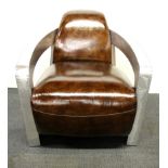 A superb leather upholstered Aviator chair, W. 73cm, D. 77cm, H. 75cm.