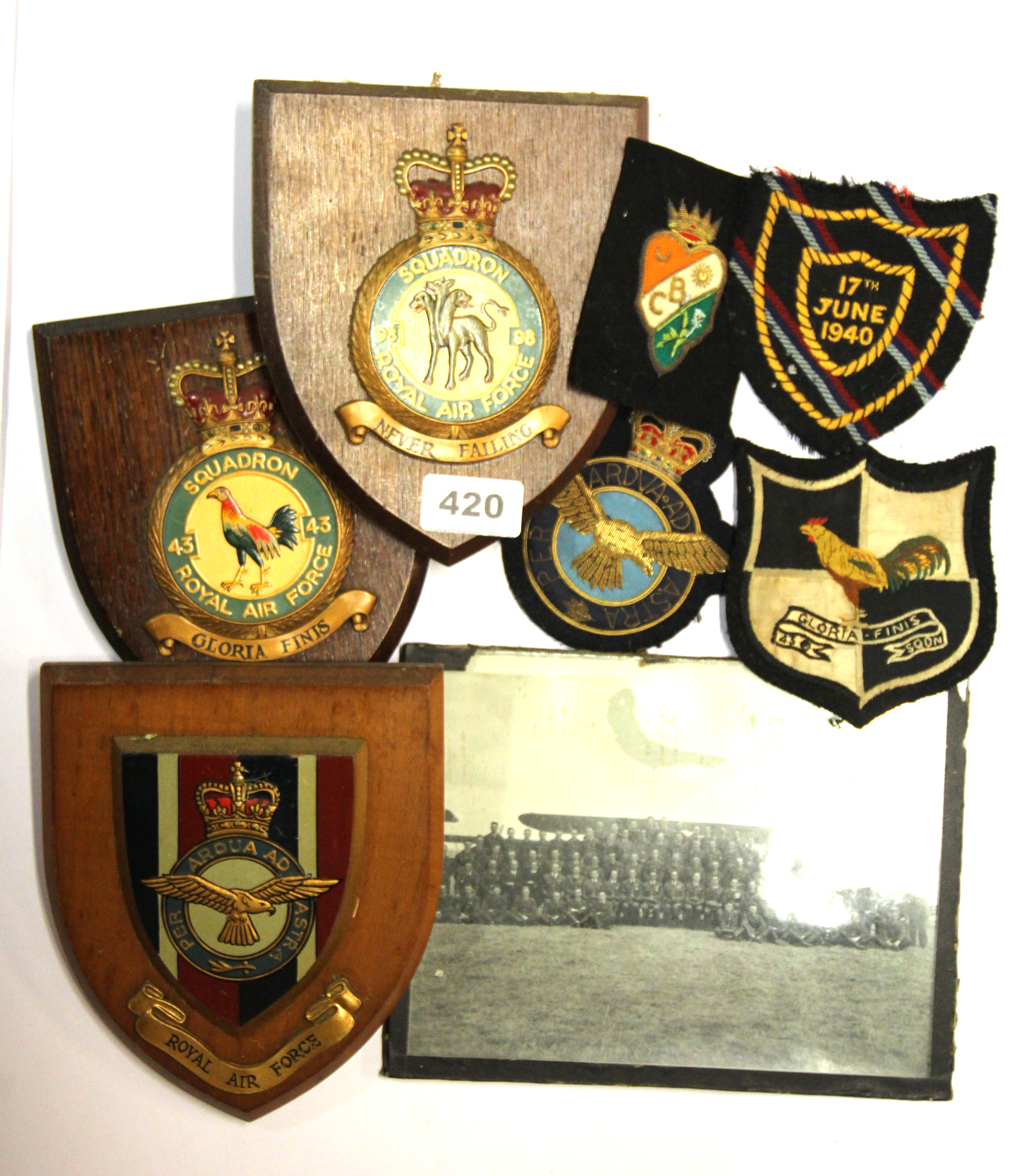 Three Royal Air Force shields and a vintage RAF photograph, together with four blazer badges.